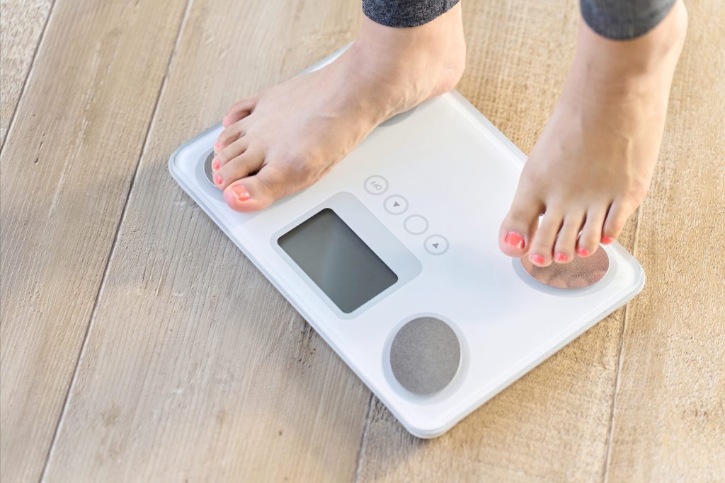 A woman's feet on a scale