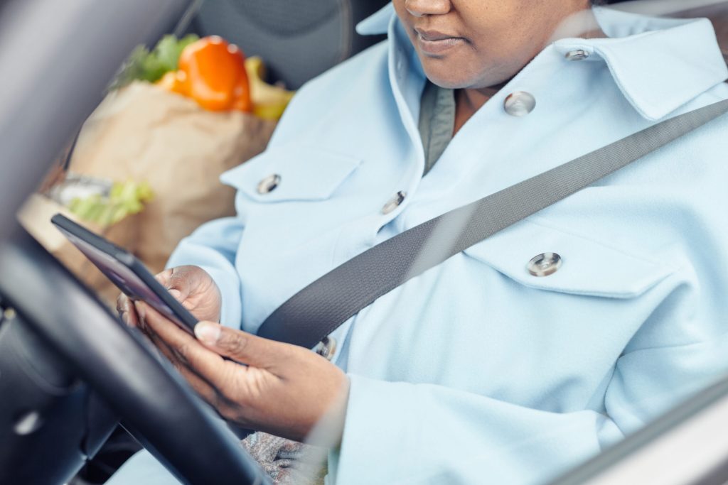 young woman in the driver's seat after gastric sleeve surgery