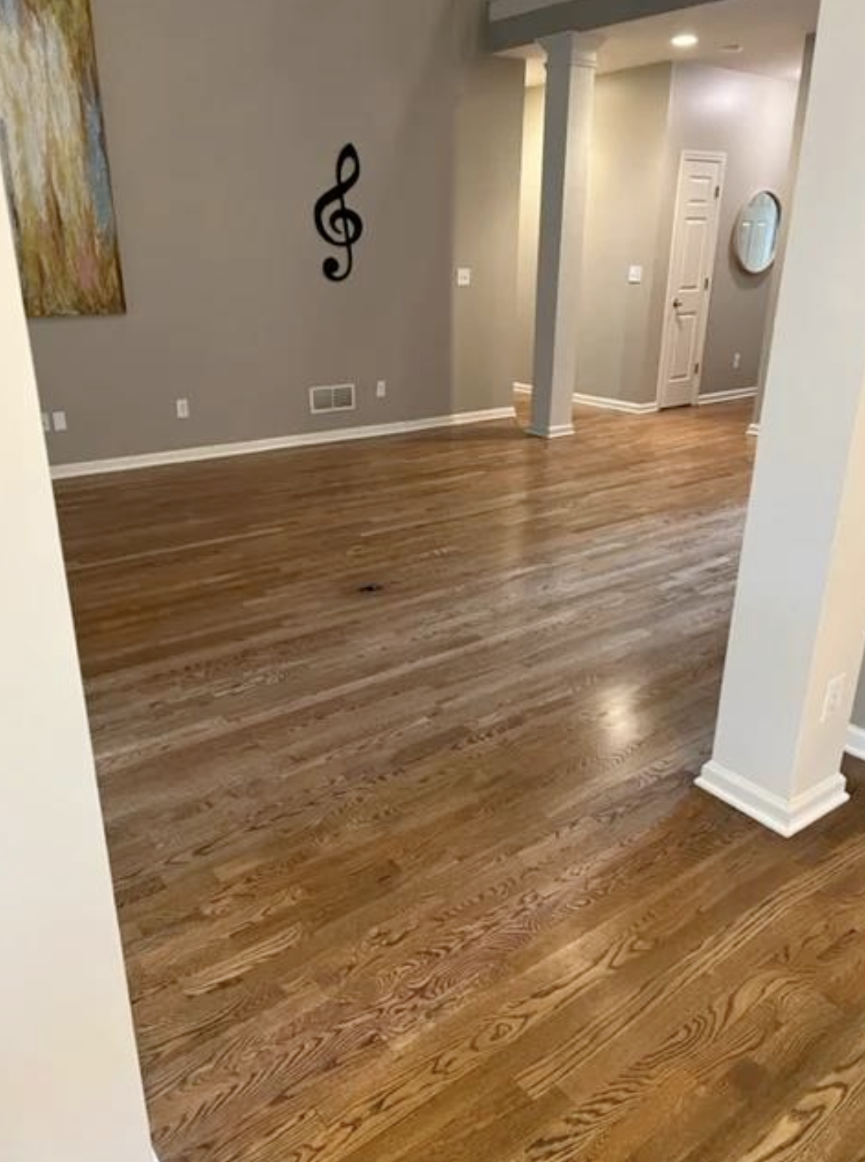Site-finished White Oak and Anderson Tuftex herringbone stair runner in Cumming, GA by Concept Flooring