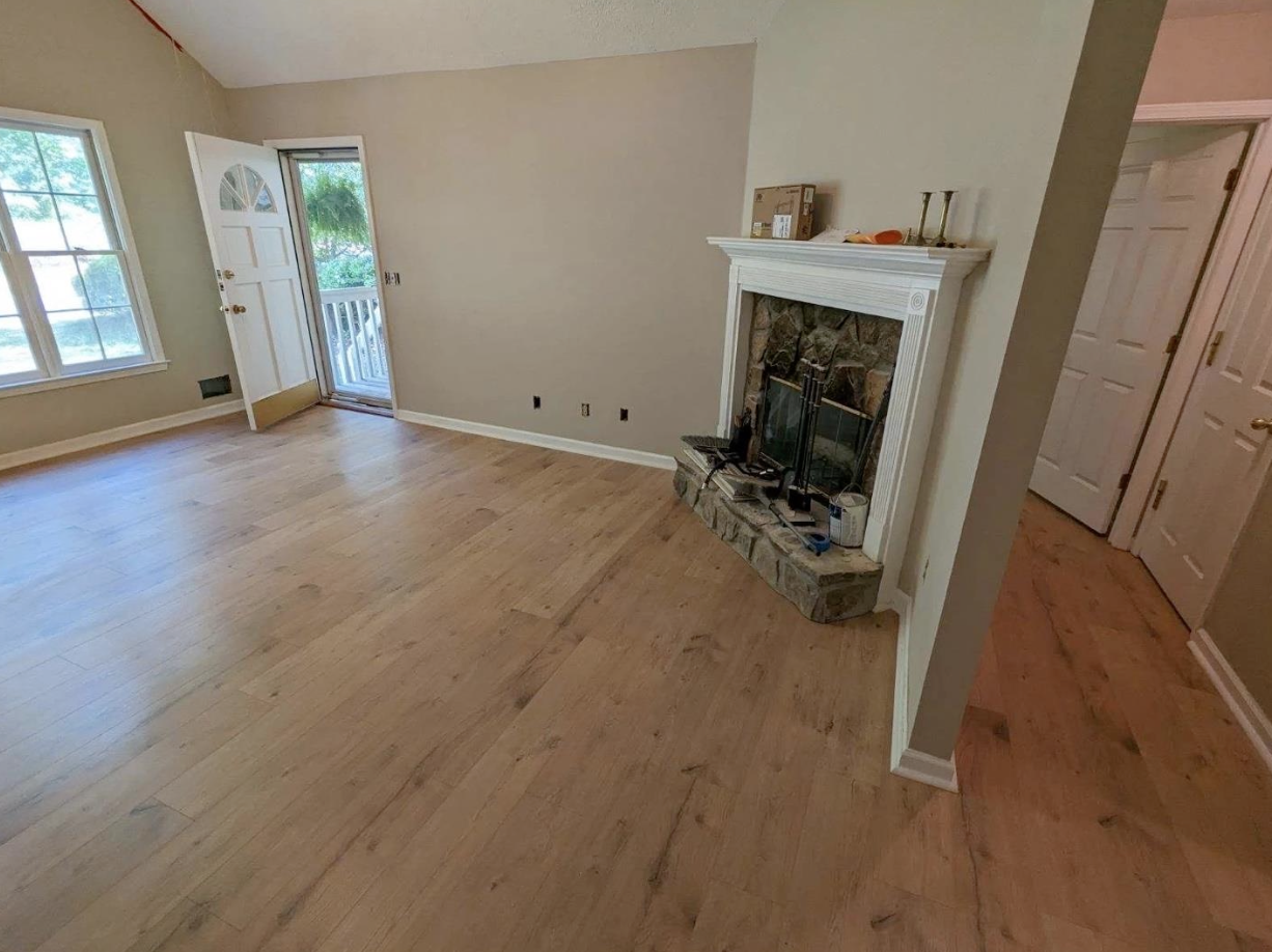 1,432 sq ft Engineered Floors laminate installed across full main level in Woodstock, GA by Concept Flooring