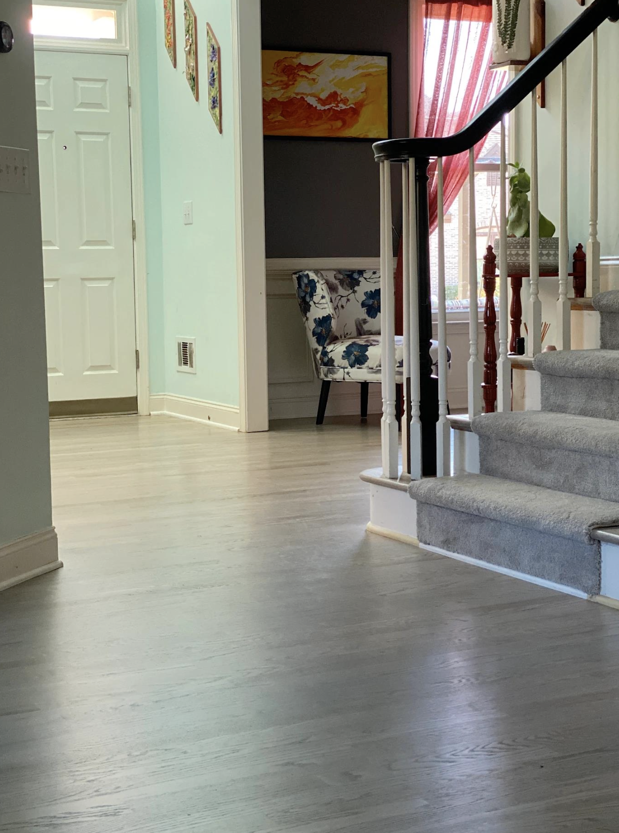 New Red Oak hardwood and refinished existing floors in custom grey stain in Milton, GA by Concept Flooring
