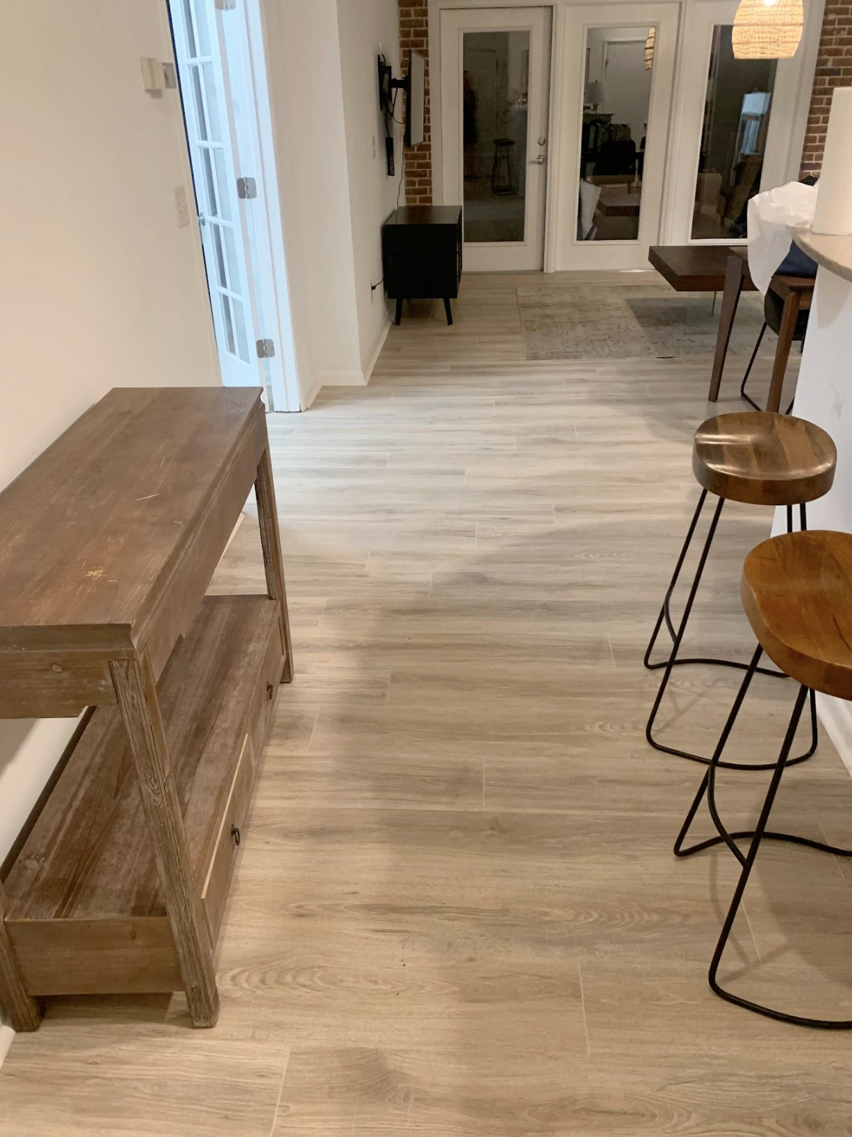 730 sq ft Mohawk Rare Vintage laminate installed in flood-damaged Atlanta, GA condo by Concept Flooring