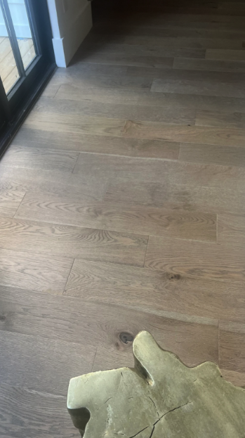 3,100 sq ft prefinished French Oak wide-plank hardwood installed in new custom Woodstock, GA home by Concept Flooring