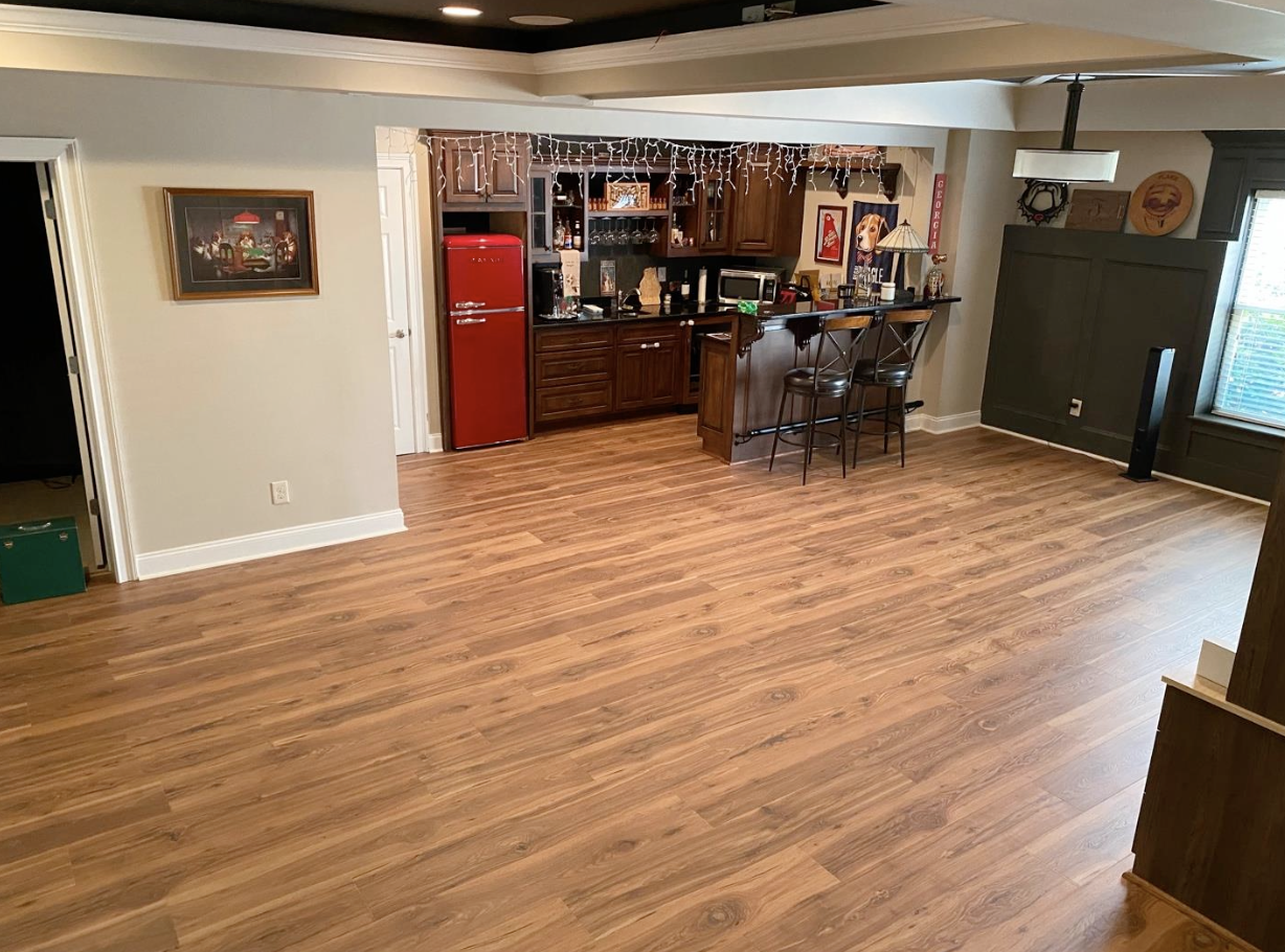 660 sq ft Mohawk RevWood laminate installed on lower level in Smyrna, GA by Concept Flooring