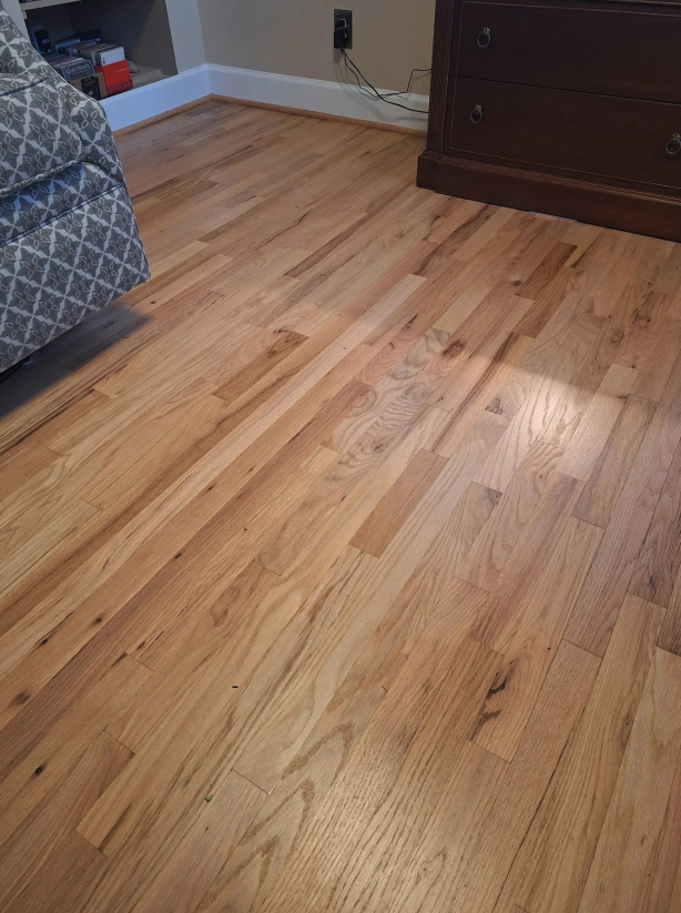 Red oak hardwood floors refinished in a natural stain with a satin finish by Concept Flooring in metro Atlanta