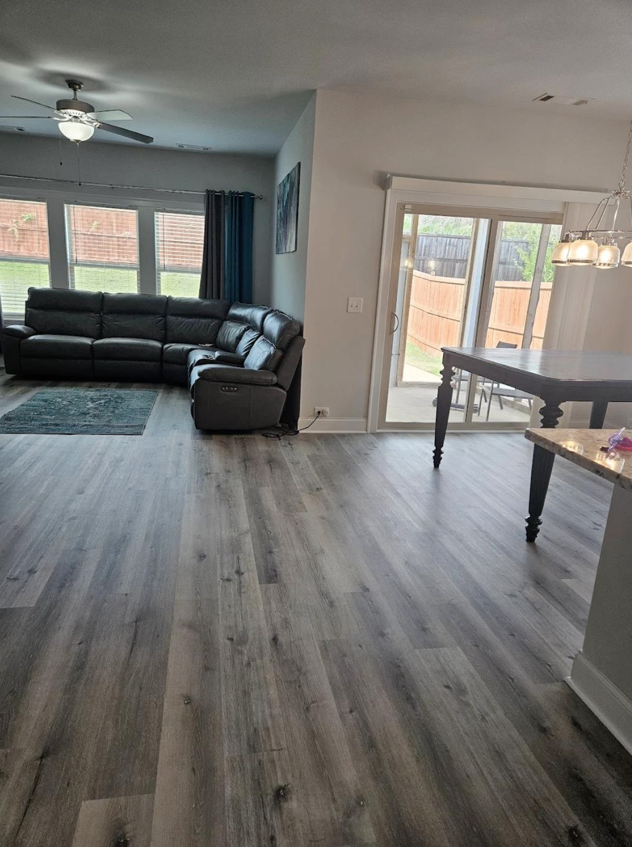 929 sq ft LVP flooring installed across full main level in Woodstock, GA by Concept Flooring