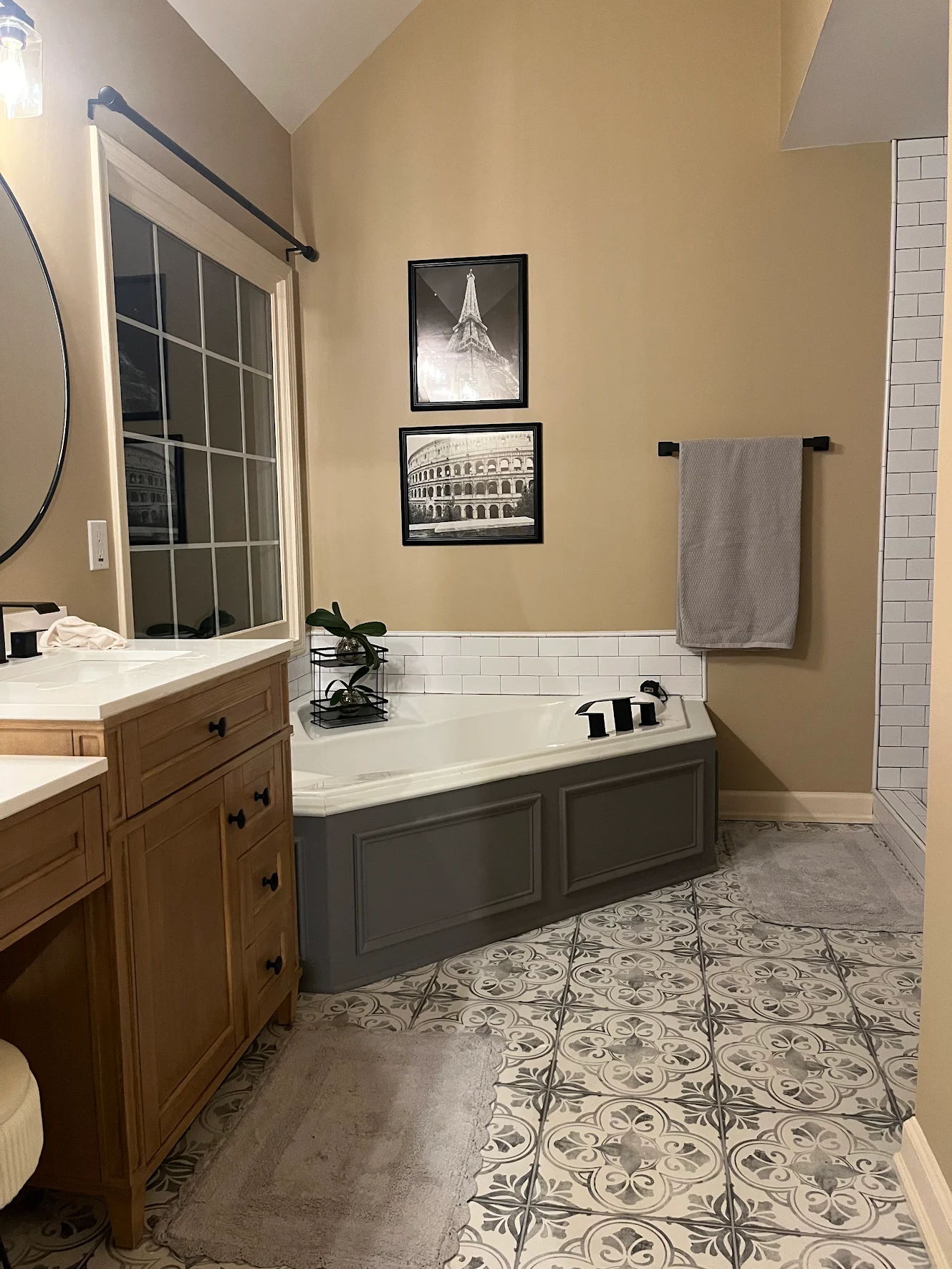 Custom tiled walk-in shower with glass enclosure