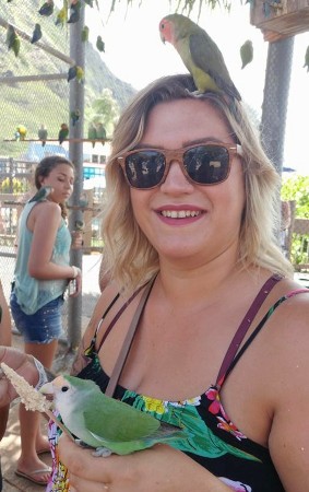 Kelsey G holding a bird