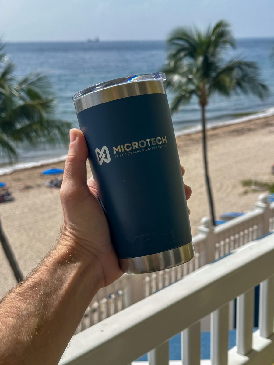 A Microtech tumbler overlooking the beach at the 2026 retreat