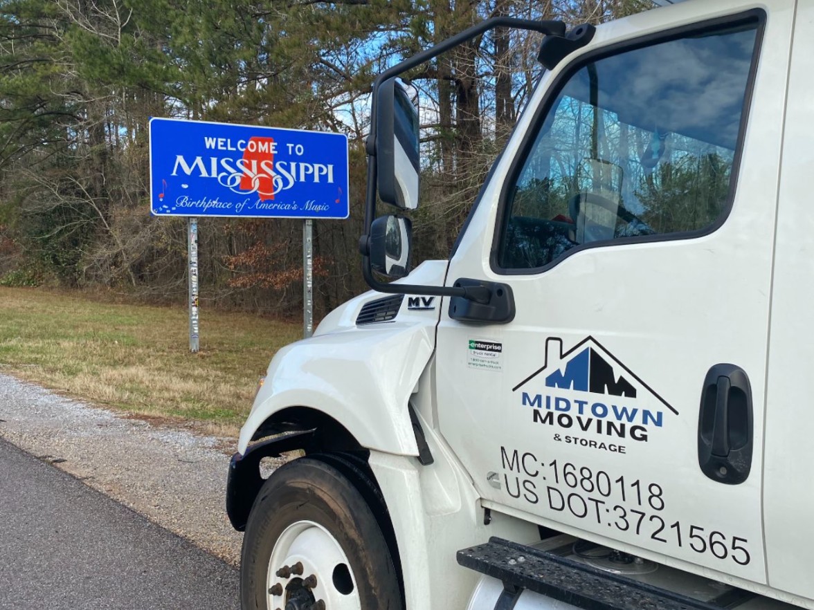 Midtown Moving box truck on the interstate at the Mississippi state line