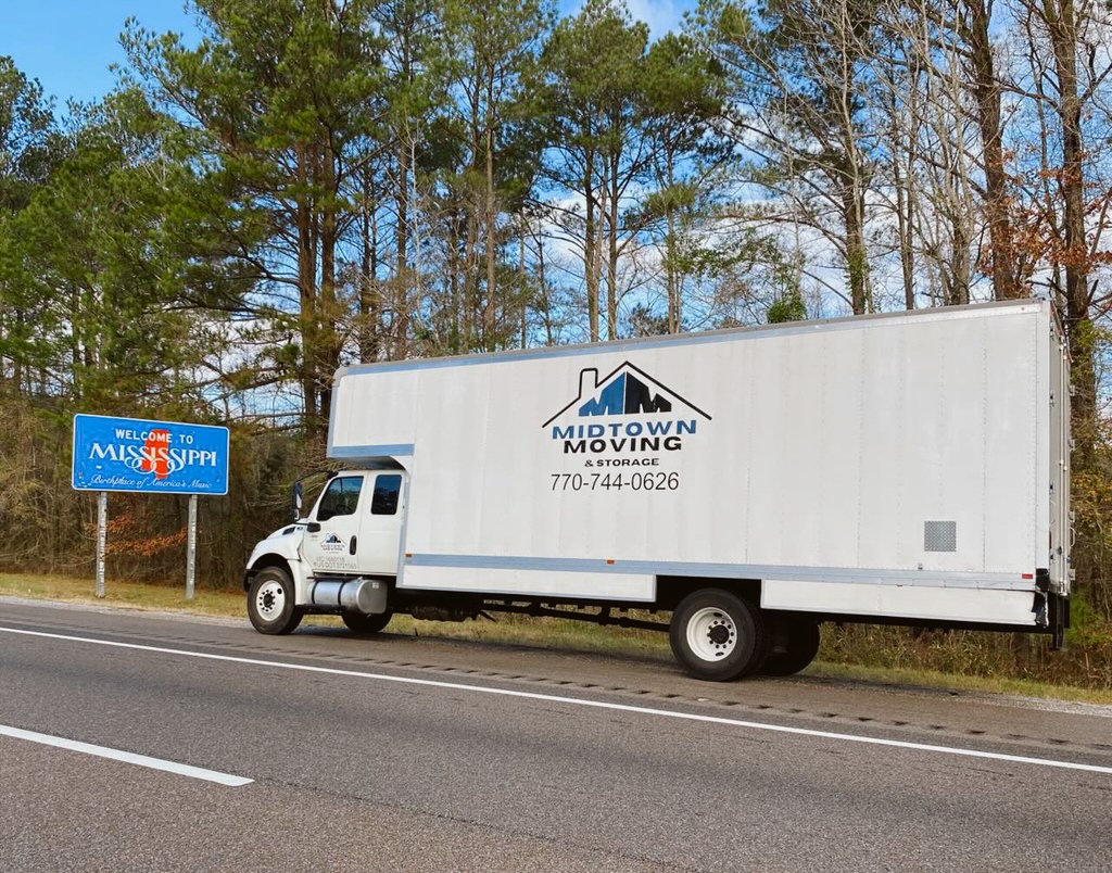 Midtown Moving box truck on the interstate at the Mississippi state line