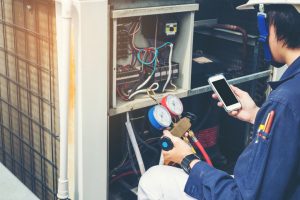 Technician checks furnace