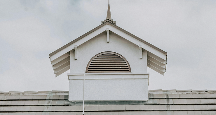 white gable with a grey vent