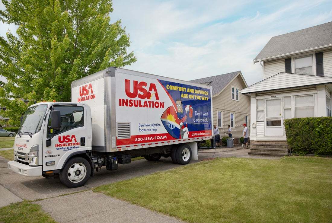 USA Insulation of Toledo service truck at a customer's home